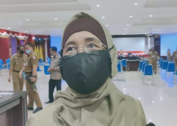 HARGANAS KE-27, DP3AKB BALIKPAPAN BAGIKAN KONDOM DAN PIL KB