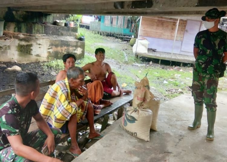 KOMUNIKASI BANGUN PERSAUDARAAN WARGA DAN SATGAS TMMD