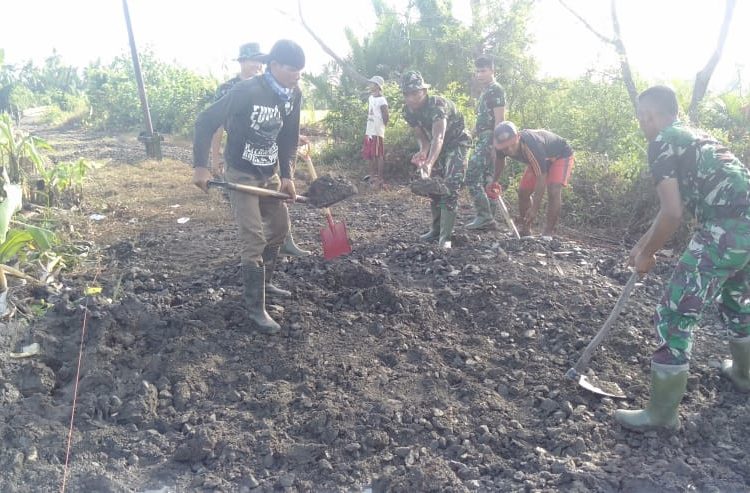 CUACA TIDAK MENENTU, SATGAS TMMD KEJAR TARGET PEMBANGUNAN