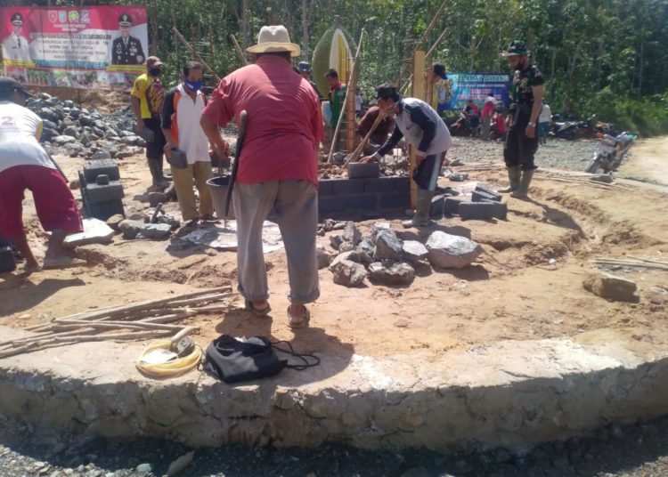 TUGU DURIAN JALAN MASUK LOKASI TMMD DESA BIIH DIBANGUN