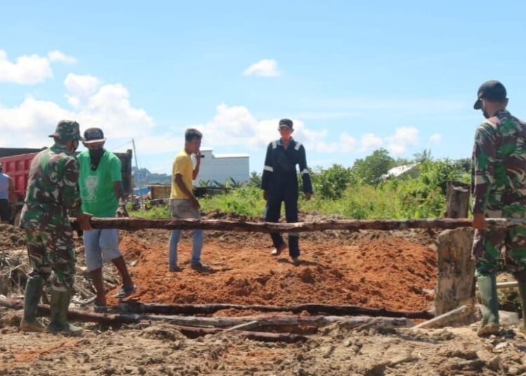 SATGAS TMMD TERUS KEBUT PENGERJAAN JALAN 1.100 METER