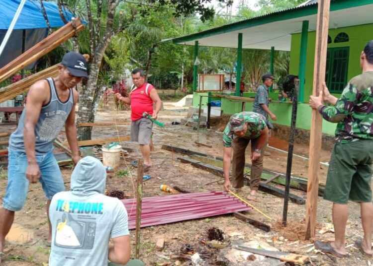 LENGKAPI SARANA IBADAH, SATGAS TMMD BANGUN TEMPAT WUDHU