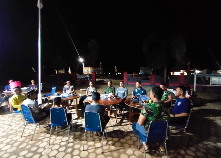 Malam Keharmonisan Warga Desa Dengan Personil TMMD