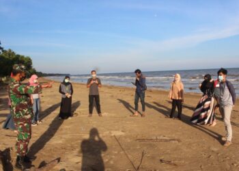 LIBUR PANJANG BOLEH BERWISATA KE PANTAI TAPI HARUS 3M DAN 1K, PESAN BABINSA TANJUNG