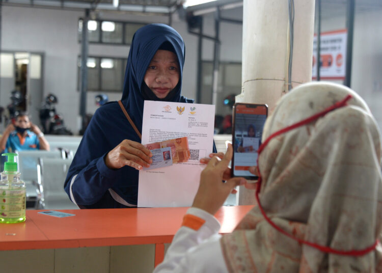 REALISASI 82%, BANSOS JAGA DAYA BELI MASYARAKAT