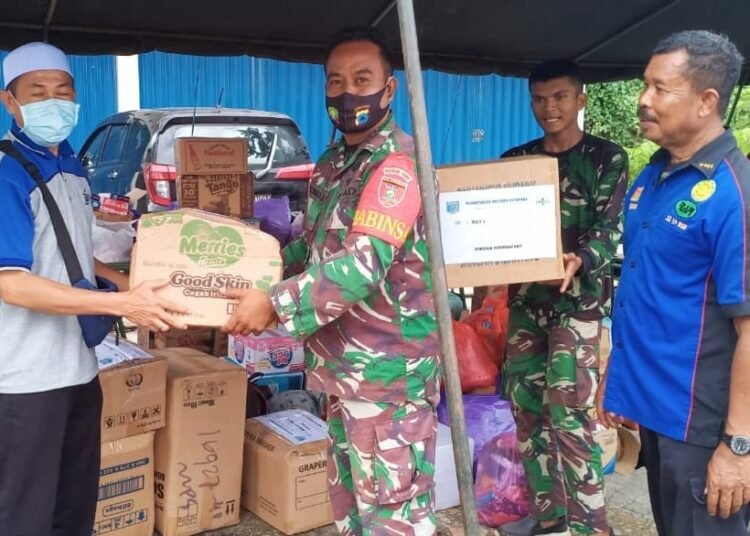 TNI AD DIRIKAN POSKO BANJIR DI HST