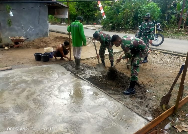 SATGAS TMMD IKHLAS BANTU WARGA
