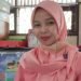 RUJIAH, BANGGA 12 TAHUN MENJAGA PERPUSTAKAAN