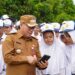 PIMPIN UPACARA DI SMPN 11, INI PESAN PJ BUPATI