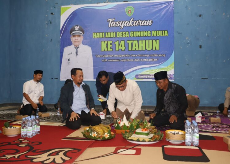 BERUSIA 14 TAHUN, INI PESAN BUPATI KE DESA GUNUNG MULIA